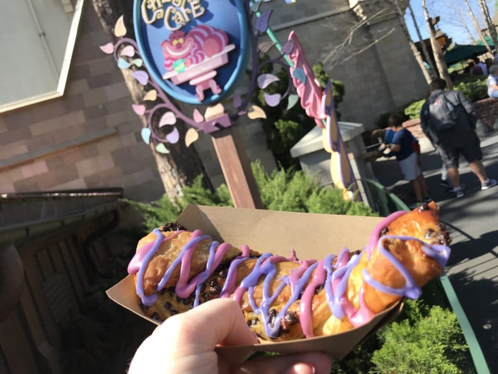 Cheshire Cat Tail - best snacks at Disney World! #disneyworld #disneyfood #disneysnacks #disneytrip #disneyvacation #travelagent
