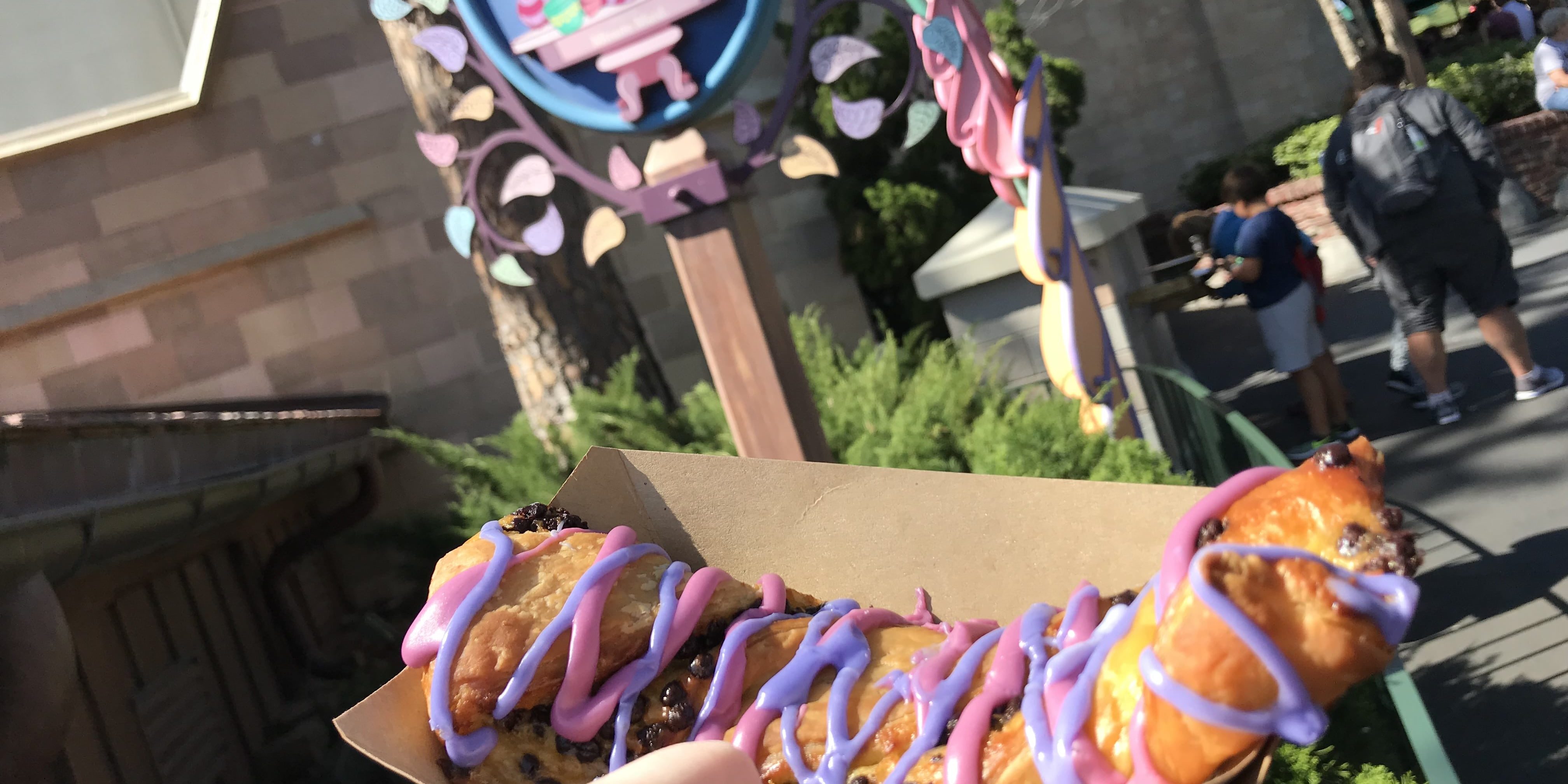 cheshire cat tail Cheshire Cat Tail - best snacks at Disney World! #disneyworld #disneyfood #disneysnacks #disneytrip #disneyvacation #travelagent